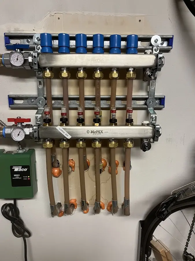 Plumber performing Water Heater Repair at a residential property in Reading